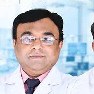Dr Bharat Agravat, dental implant surgeon, Ahmedabad