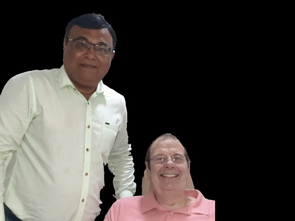 Dr Bharat Agravat with an international dental implant patient
